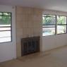 Living_Room_fireplace_view_backyard